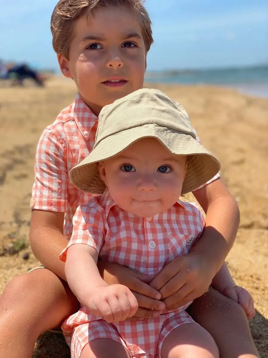 Apricot plaid polo romper | Me & Henry