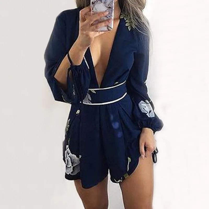 BACKLESS NAVY FLORAL ROMPER