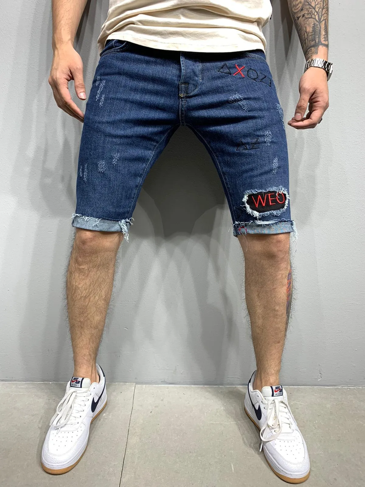 Sneakerjeans Patched Blue Ripped Jeans Short AY974