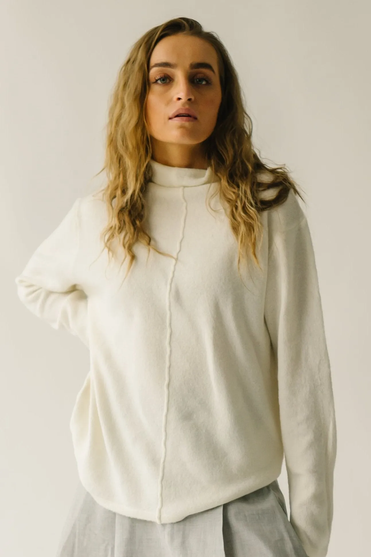 The Tindle Mock Neck Sweater in Cream